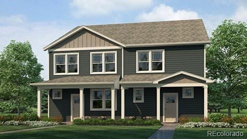 1356 S Boston Ct Unit B, Denver, CO 80247 - view of front facade with a front lawn
