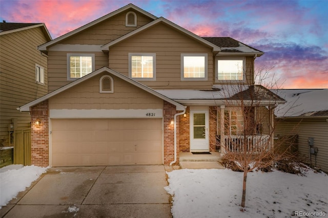 front of property featuring a garage