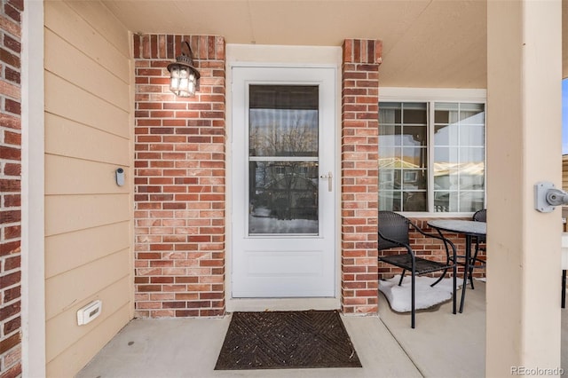 entrance to property with a porch