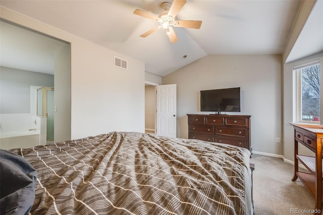 carpeted bedroom featuring vaulted ceiling and ceiling fan