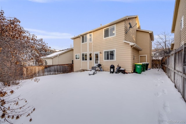 view of snow covered property