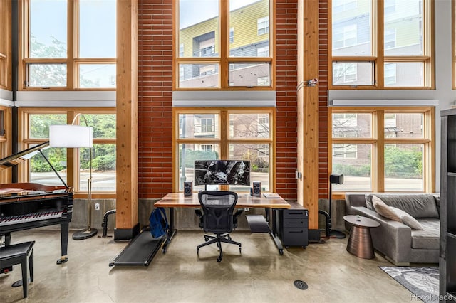 2955 Inca St Unit 1H, Denver, CO 80202 - office featuring a high ceiling, concrete flooring, plenty of natural light, and french doors
