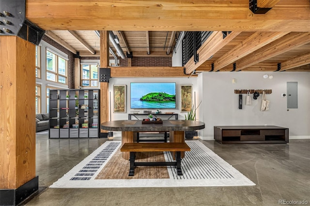 2955 Inca St Unit 1H, Denver, CO 80202 - living room with finished concrete floors, electric panel, and a wood ceiling with exposed beams