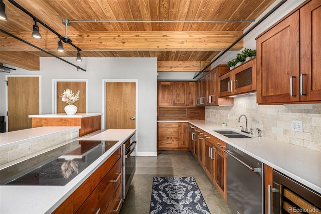 2955 Inca St Unit 1H, Denver, CO 80202 - kitchen with appliances with stainless steel finishes, wood ceiling, beverage cooler, concrete flooring, and brown cabinetry