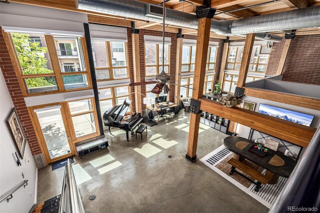 2955 Inca St Unit 1H, Denver, CO 80202 - below grade area featuring brick wall