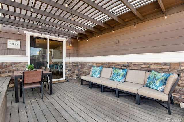 wooden terrace featuring outdoor lounge area and a pergola