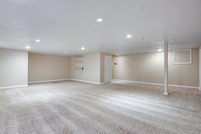 finished basement featuring carpet flooring, recessed lighting, and baseboards