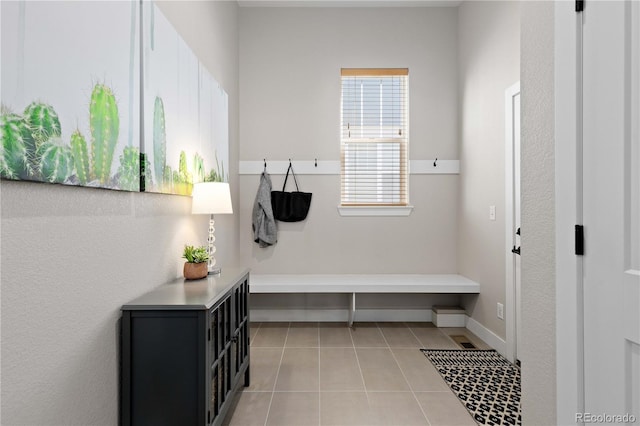 13729 Vallejo Loop, Broomfield, CO 80023 - mudroom featuring light tile patterned floors
