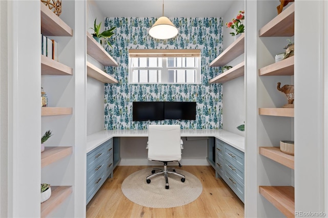 13729 Vallejo Loop, Broomfield, CO 80023 - office space featuring built in desk, light wood-style flooring, and wallpapered walls