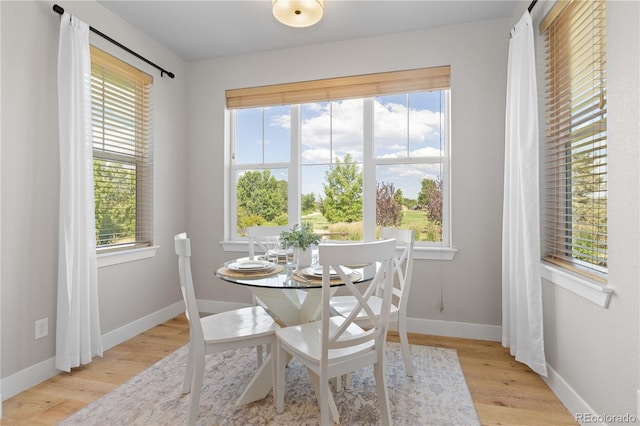 13729 Vallejo Loop, Broomfield, CO 80023 - dining area with healthy amount of natural light and light wood-style floors