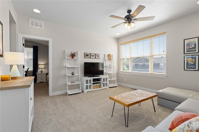 13729 Vallejo Loop, Broomfield, CO 80023 - living area with ceiling fan, light colored carpet, and recessed lighting