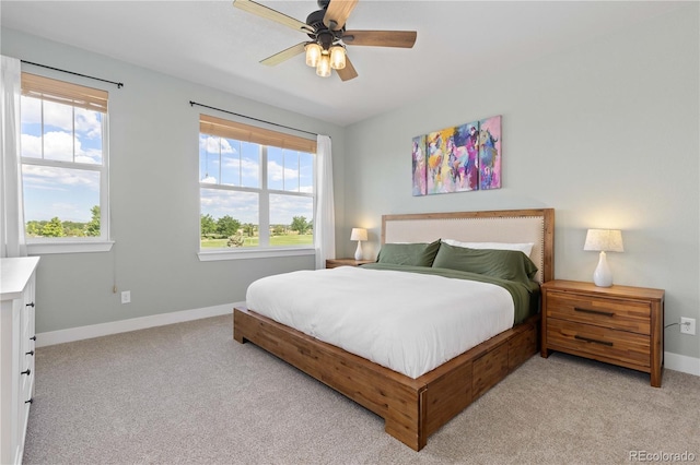 13729 Vallejo Loop, Broomfield, CO 80023 - bedroom with light carpet, multiple windows, and a ceiling fan