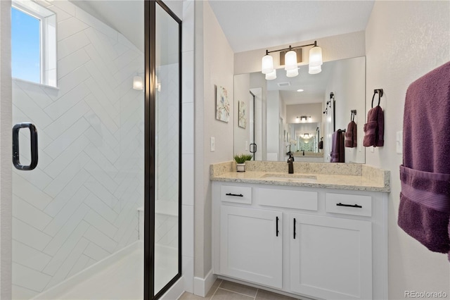 13729 Vallejo Loop, Broomfield, CO 80023 - bathroom with vanity, a shower stall, and tile patterned flooring