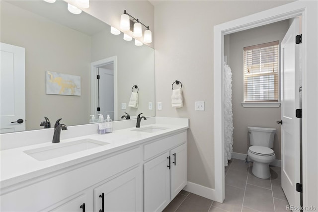 13729 Vallejo Loop, Broomfield, CO 80023 - bathroom with double vanity and tile patterned flooring