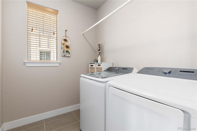 13729 Vallejo Loop, Broomfield, CO 80023 - laundry area with washing machine and clothes dryer and tile patterned flooring