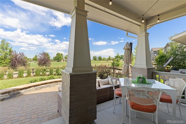 13729 Vallejo Loop, Broomfield, CO 80023 - view of patio / terrace with outdoor dining area and view of golf course