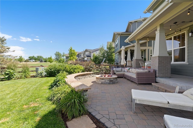 13729 Vallejo Loop, Broomfield, CO 80023 - view of patio / terrace featuring an outdoor living space with a fire pit