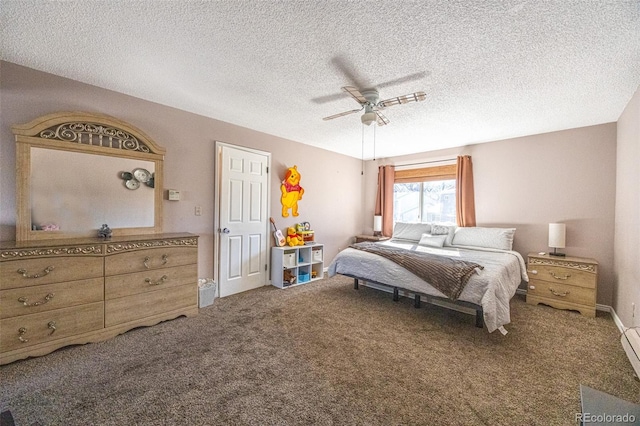 bedroom featuring a textured ceiling, ceiling fan, and carpet