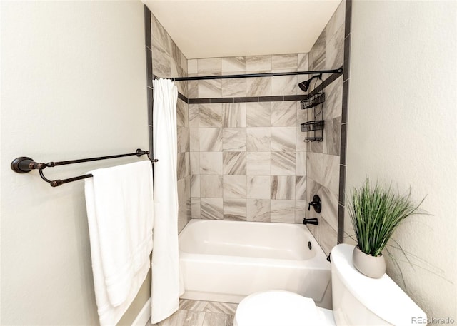 bathroom with toilet and shower / bath combination with curtain