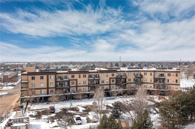 view of snow covered property