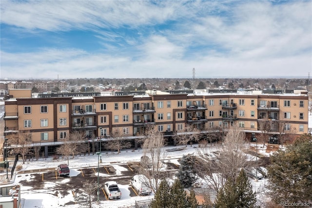 view of snow covered property