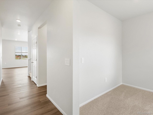 2717 73rd Avenue Ct, Greeley, CO 80634 - hallway with baseboards, recessed lighting, and dark wood-type flooring