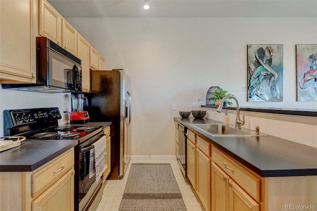 kitchen with sink, appliances with stainless steel finishes, backsplash, and light tile patterned floors