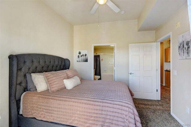 carpeted bedroom with ceiling fan, lofted ceiling, and ensuite bathroom