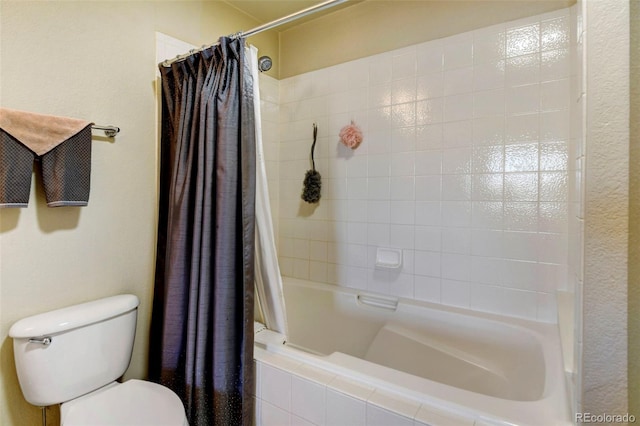 bathroom featuring toilet and shower / tub combo