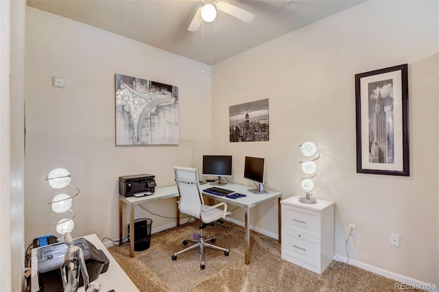 office space with light carpet and ceiling fan