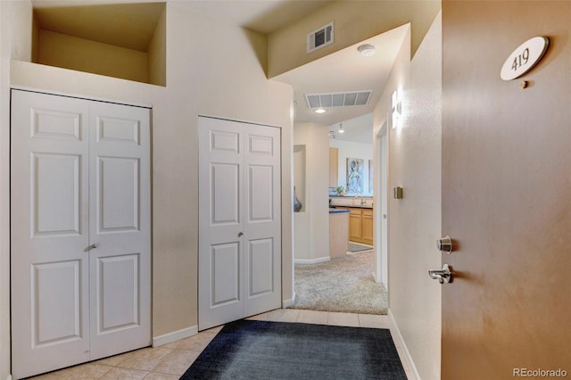 interior space featuring light tile patterned floors