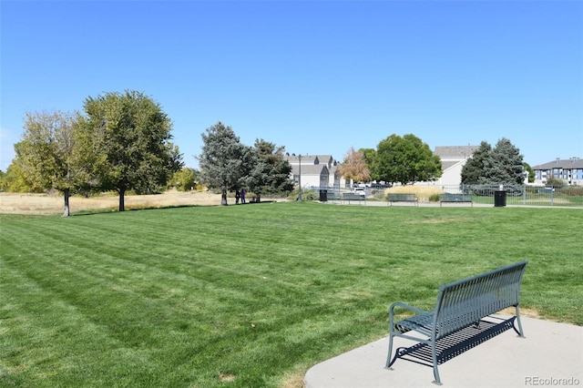 view of community featuring a yard