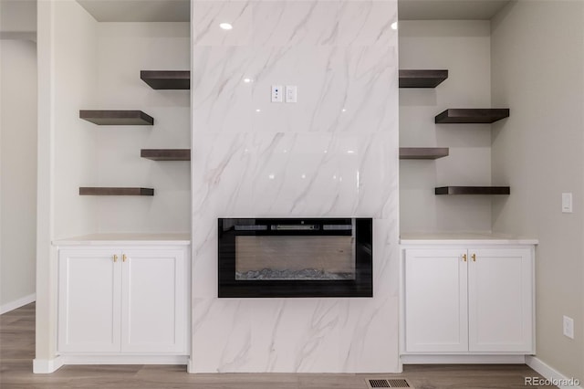 56159 E Tomahawk Ave, Strasburg, CO 80136 - detailed view of wood finished floors and baseboards
