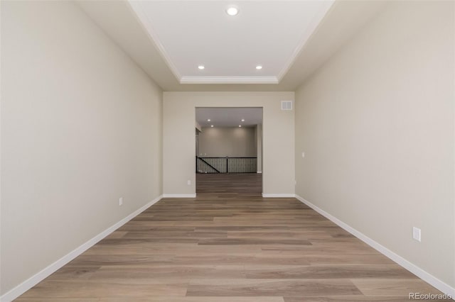 56159 E Tomahawk Ave, Strasburg, CO 80136 - unfurnished room with recessed lighting, baseboards, light wood-style floors, and ornamental molding