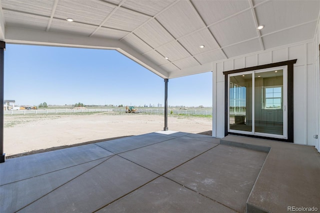 56159 E Tomahawk Ave, Strasburg, CO 80136 - view of patio with fence and a view of rural / pastoral area