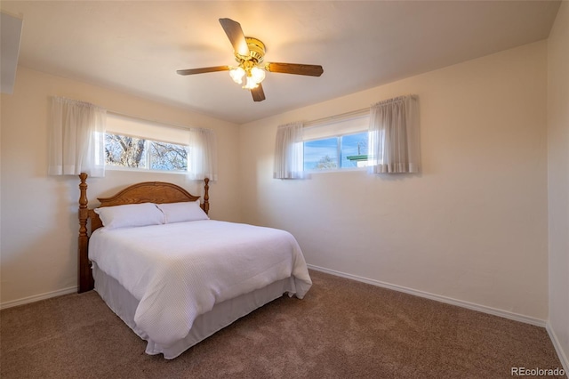 971 Elm Pl, Thornton, CO 80229 - carpeted bedroom with baseboards and ceiling fan