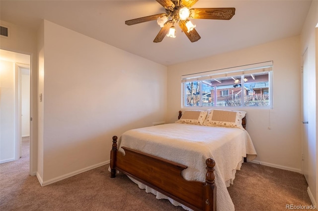 971 Elm Pl, Thornton, CO 80229 - bedroom with carpet, baseboards, and a ceiling fan