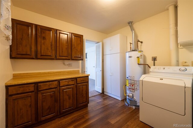 971 Elm Pl, Thornton, CO 80229 - laundry room with washer / clothes dryer, gas water heater, cabinet space, and dark wood-style floors