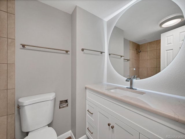 850 20th St Unit 503, Boulder, CO 80302 - bathroom with vanity, toilet, and a tile shower