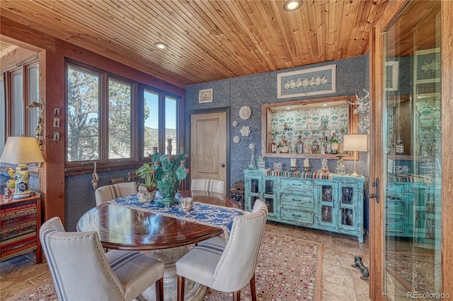 dining area with wooden ceiling