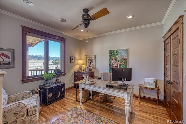 home office featuring light hardwood / wood-style floors, crown molding, and ceiling fan