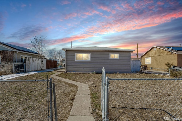 view of property exterior at dusk