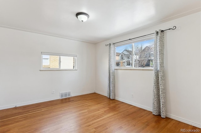 empty room featuring wood-type flooring