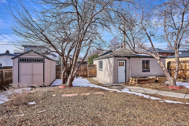 exterior space with a shed