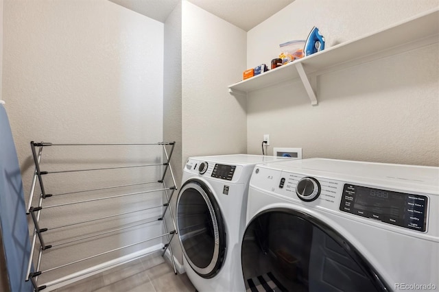 laundry room with washer and dryer