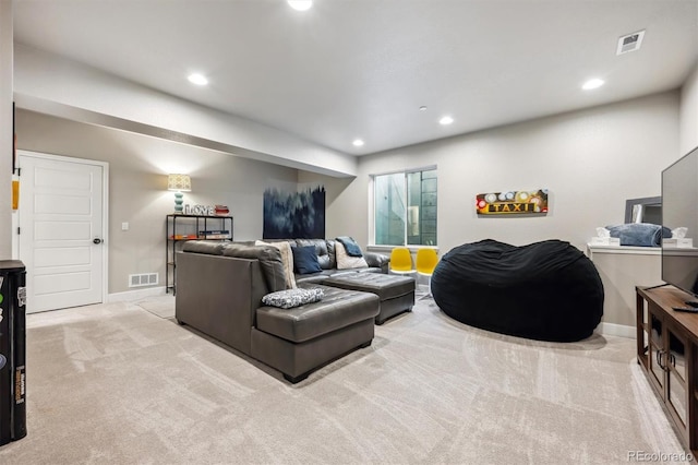 living area with carpet floors, recessed lighting, and baseboards