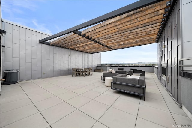 1898 S Bannock St Unit 202, Denver, CO 80223 - view of patio / terrace featuring a pergola, an outdoor hangout area, and outdoor dining area