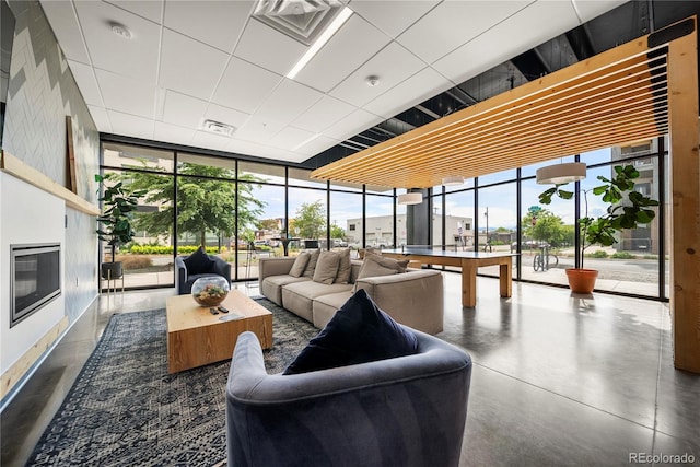 1898 S Bannock St Unit 202, Denver, CO 80223 - building lobby featuring expansive windows and a paneled ceiling