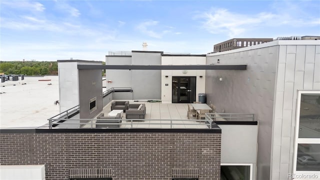 1898 S Bannock St Unit 202, Denver, CO 80223 - view of patio / terrace featuring a balcony and an outdoor hangout area