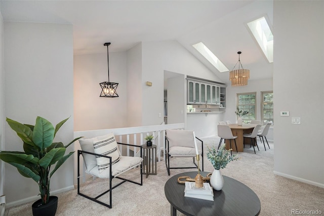 11797 W Aqueduct Dr, Littleton, CO 80127 - sitting room featuring a skylight, a chandelier, carpet, and high vaulted ceiling